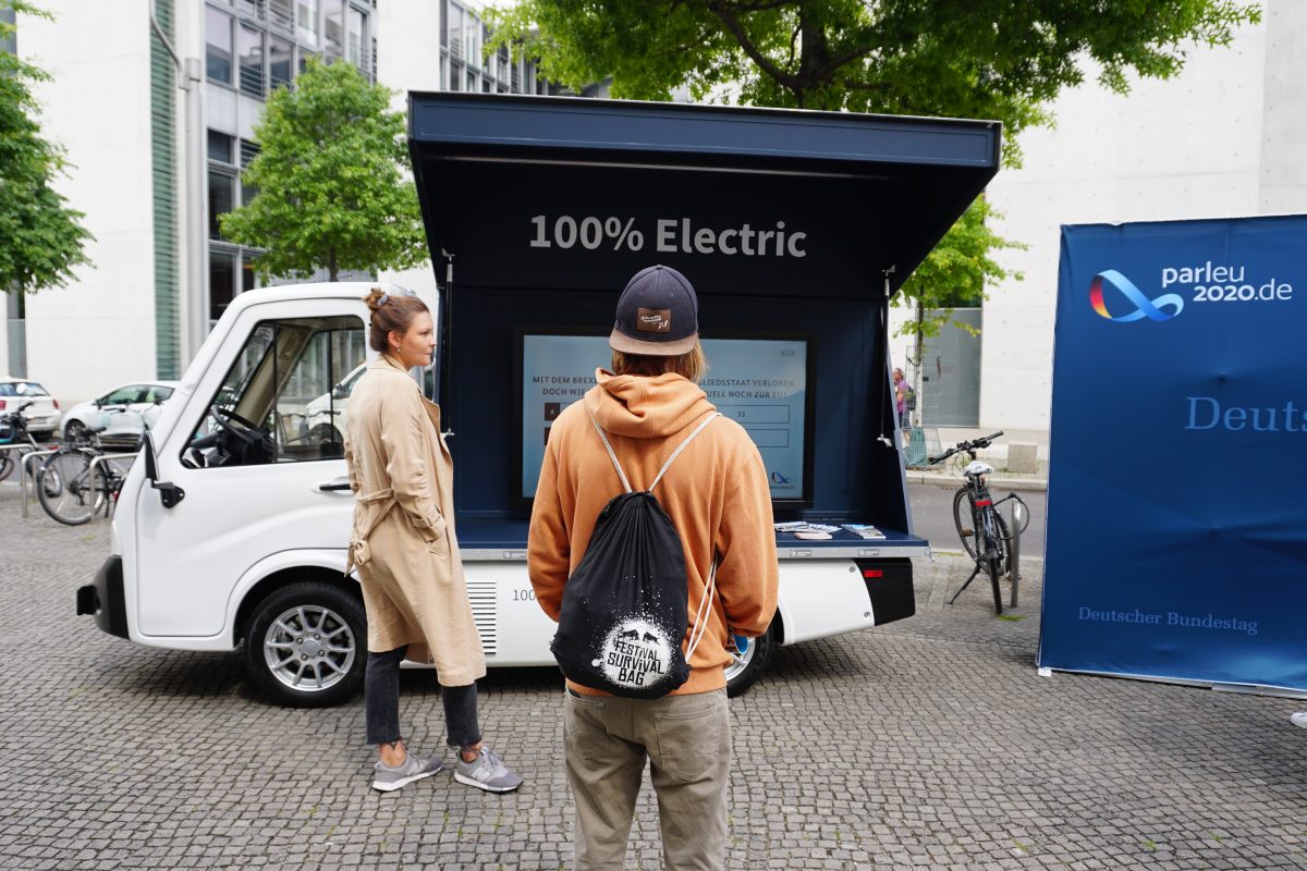 The 100% Electric E-Promotor in Germany in public square during a presentation