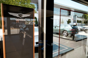 A look outside the glass interior of the Mobile Showroom, aka the Genesis Mobile Lounge.