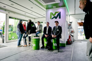 Guests enjoy some rest inside the Mobile Showroom during the busy event at Bauma in Munich 2022
