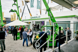 Merlo Mobile Showroom in Munich during the Bauma Trade Fair whle busy customers come to see the latest innovations.