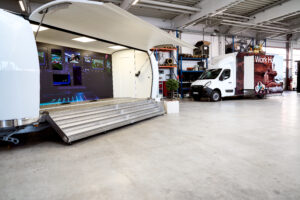 EggStreamer and CityVan on display in the warehouse of ShowTruckMarketing