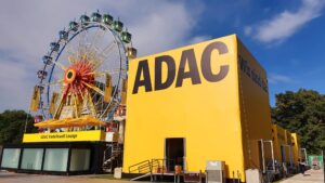 The ADAC Premium Partner Lounge in Munich with a ferris wheel in the background ready for the event to start.
